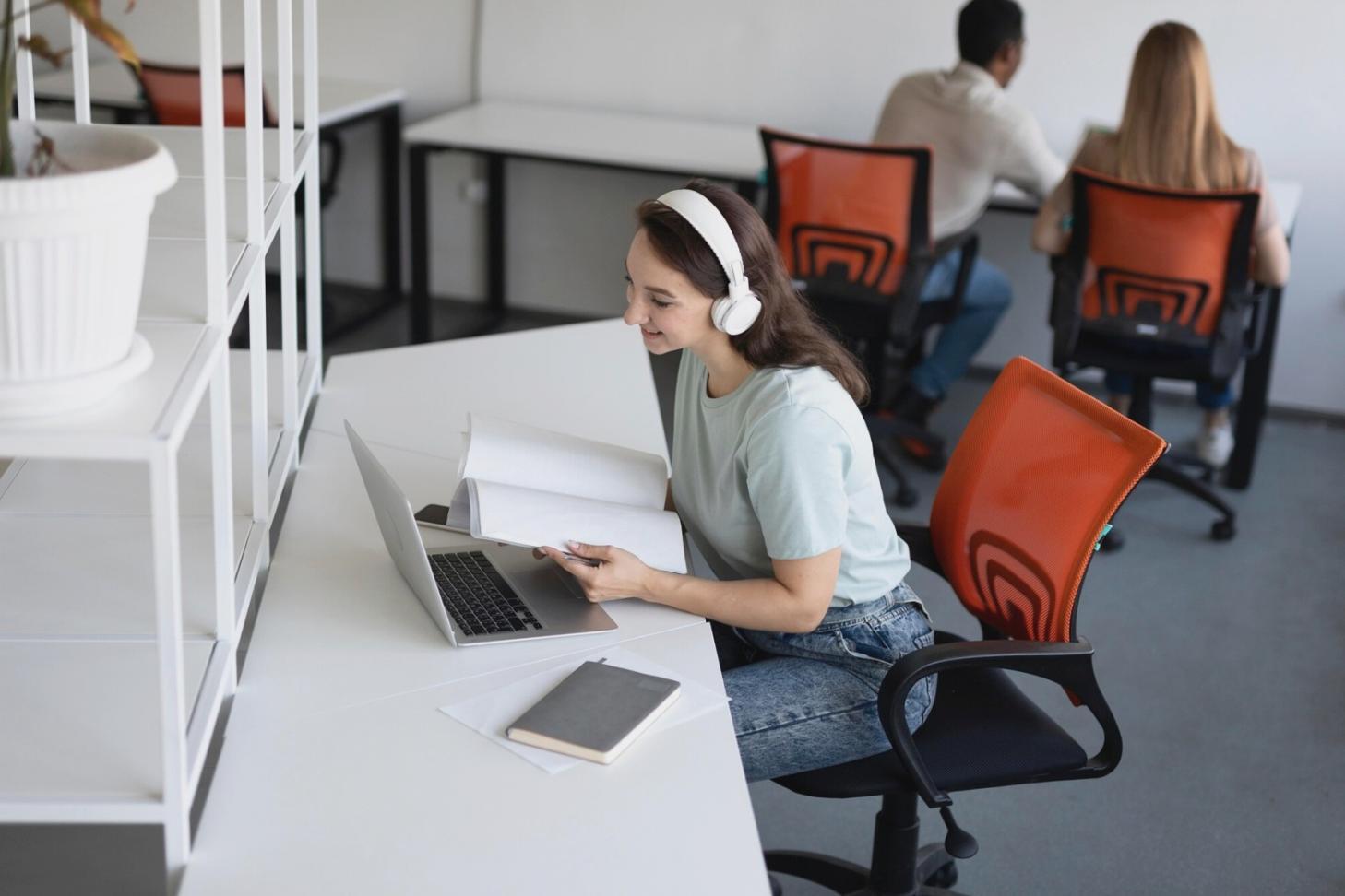 Students working on mobile game development projects